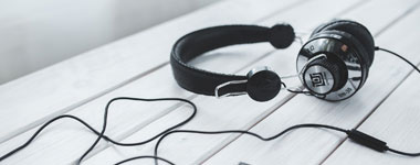 listening-to-podcast-380x150